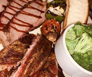 Smoke Brisket and Rib Combo Plate with broccoli and veggie skewer...